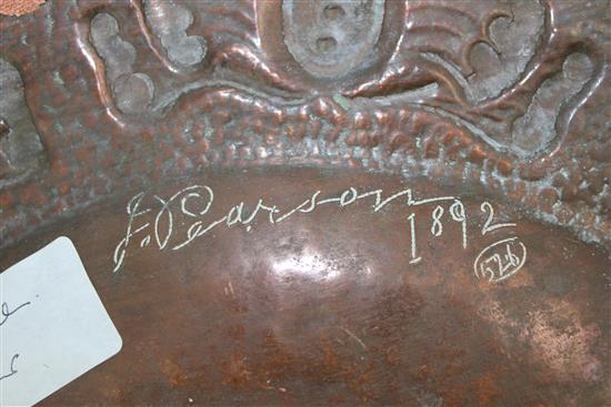 An Arts & Crafts Newlyn circular copper charger, by John Pearson, 15.25in.
